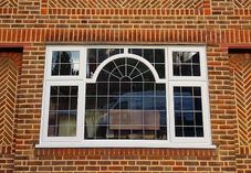 Traditional feature window with central arch and rectangle leads